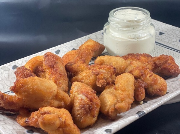 Fried and breaded chicken pieces