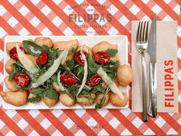 ANGIOLETTI FRITTI WITH ARUGULA AND POMODORINI