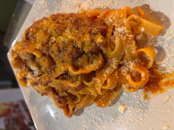 TAGLIATELLE BOLOGNESE.