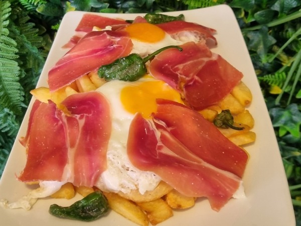 Uova strapazzate con prosciutto serrano 