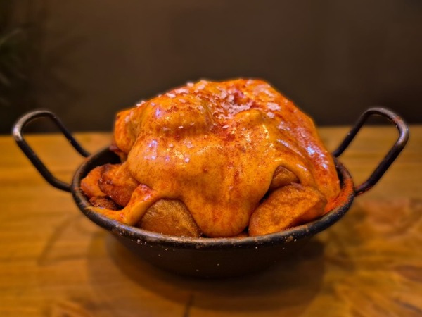 Bravas with spicy chili and honey allioli