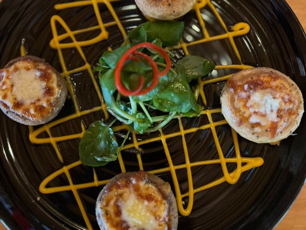 Champiñones Parmesanos