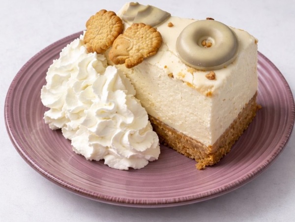 Tarta de filipinos blanco con galleta dinosaurio 