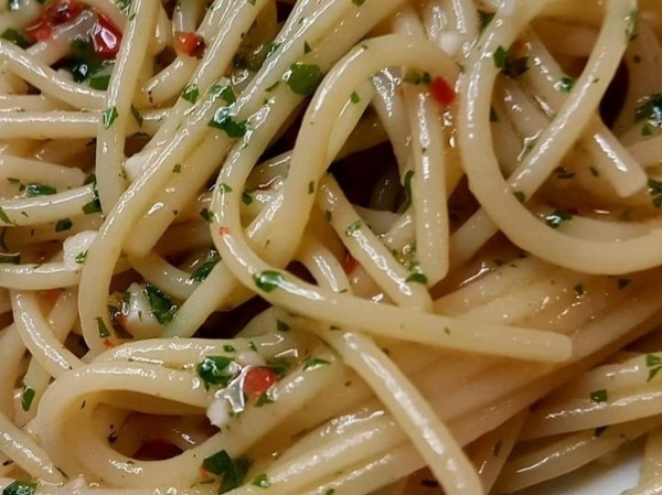 SPAGHETTI WITH GARLIC, OIL, CHILI, AND PECORINO CHEESE