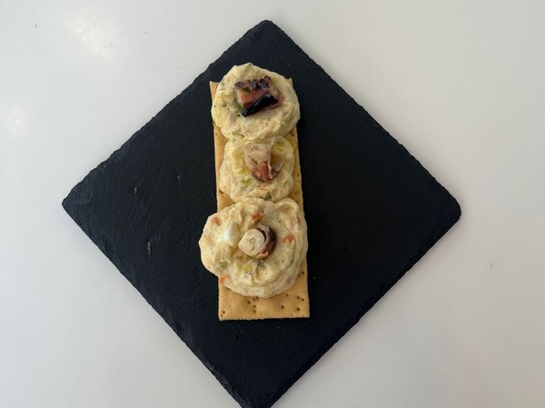MARINERA CON PULPO AL AJILLO